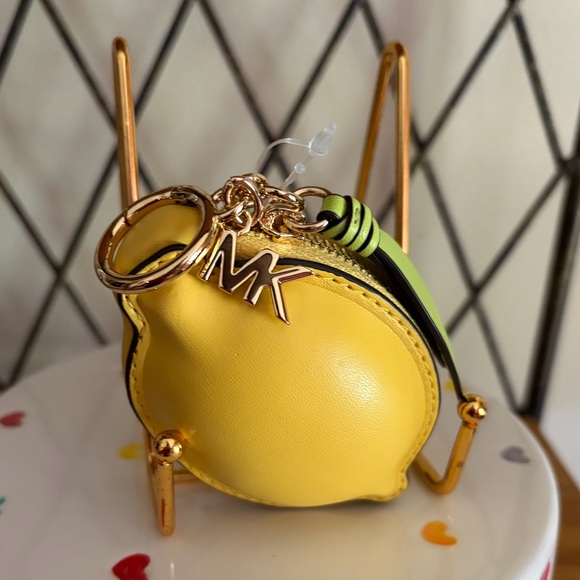 Michael Kors Handbags - Michael Kors “Lemon Coin Purse Nwt
